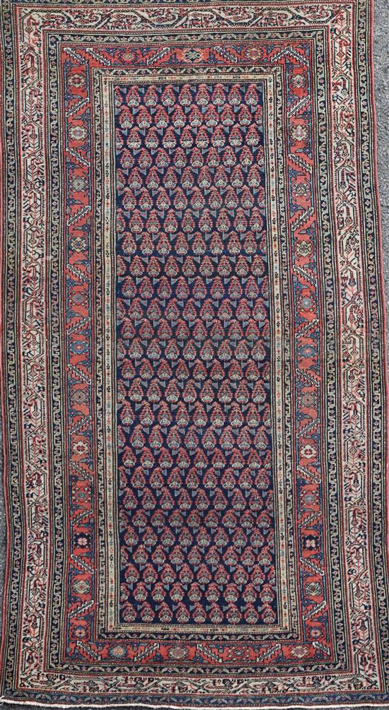 A Saraband blue ground rug, 6ft 2in by 3ft 7in.